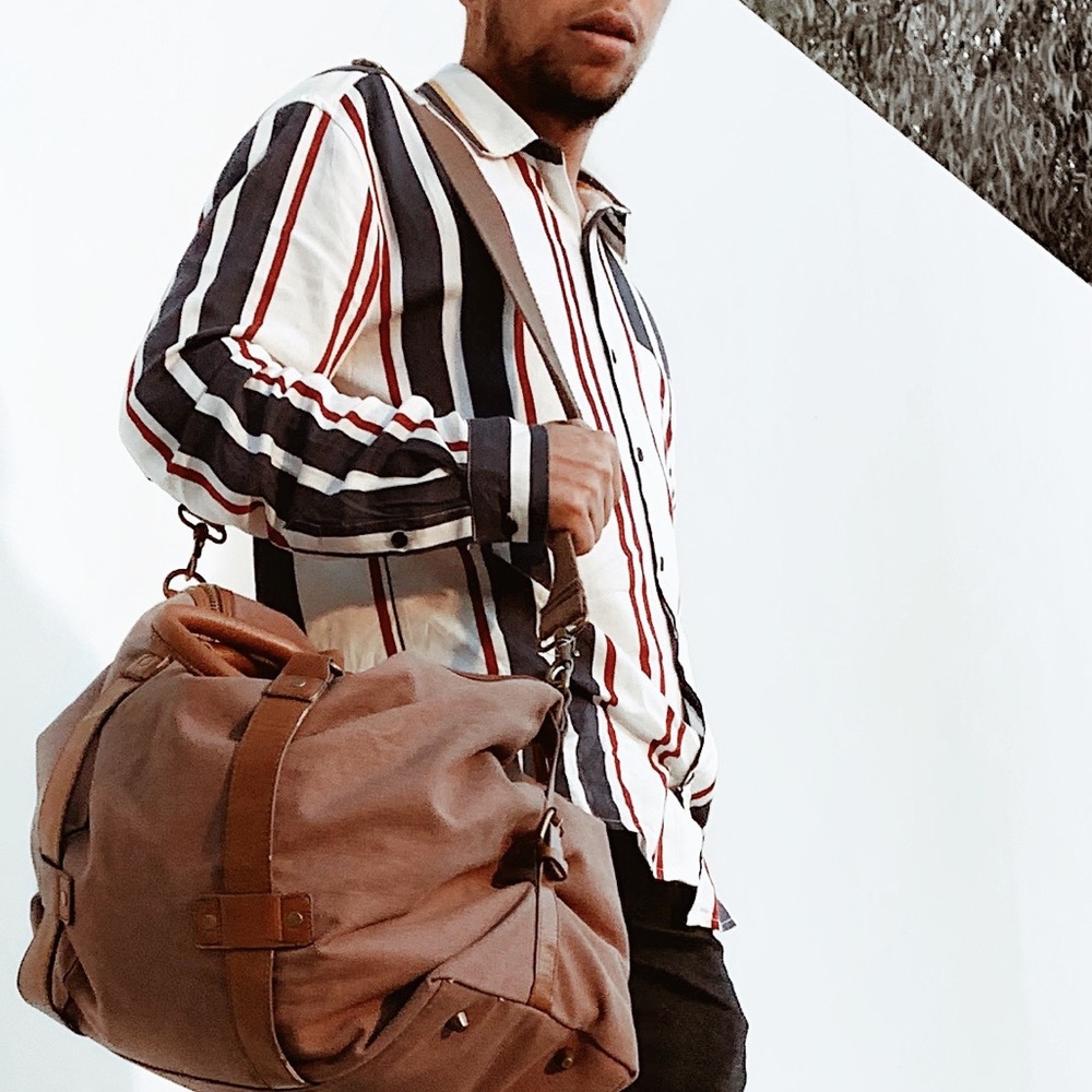 An H&M white & stripped button-up dress shirt.